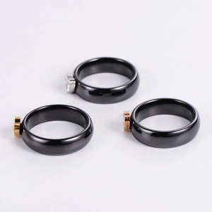Elegant black ceramic rings with heart accents in gold, silver, and rose gold finish