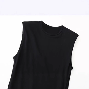 Classic black crew neck sleeveless dress with padded shoulders in soft cotton fabric