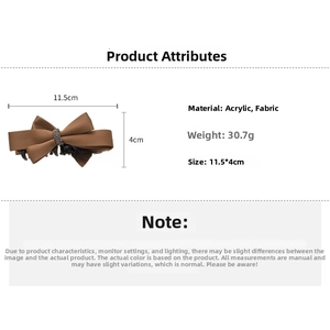 Brown satin bow banana clip with black acrylic base and rhinestones measuring 11.5x4cm