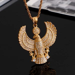 Hip hop gold eagle pendant with diamonds and Ankh symbols on a twist chain necklace