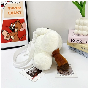 Rear view of white plush cat backpack with brown tail and white shoulder straps