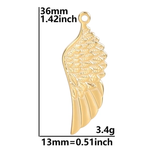 Detailed view of golden wing charm with precise 36mm height and 13mm width dimensions