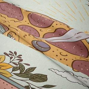 Close-up of the woven fabric texture featuring a colorful pizza illustration tapestry