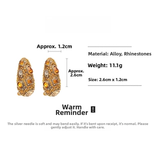 Detailed size chart showing golden geometric teardrop earrings dimensions 2.6cm by 1.2cm