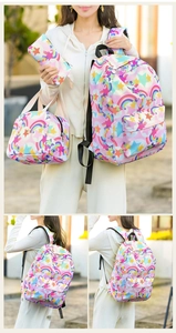 Three-piece school bag set with rainbow star pattern featuring backpack, lunch bag, and pencil case