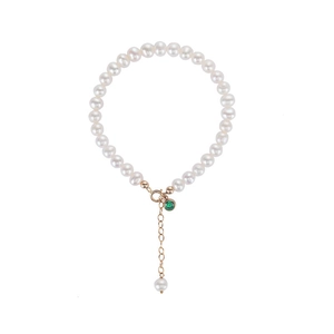 Elegant emerald freshwater pearl bracelet with gold hardware on a clean white background
