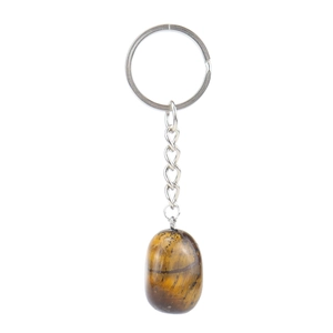 Macro detail of natural tiger eye stone keychain with polished oval brown agate pendant