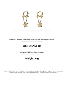 Detail of floral earring with crystals showing 3.6x1.5cm size and 6g weight specs