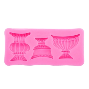 Pink silicone mold featuring three distinct European style embossed vase shapes for DIY crafts