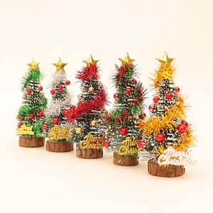 Miniature dollhouse Christmas cedar trees with gold stars and Merry Christmas signs