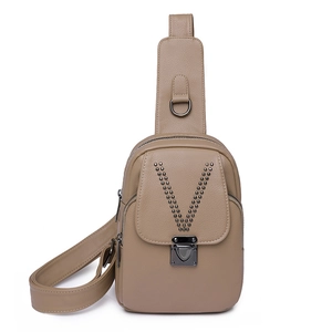 Retro PU leather sling bag in camel with V-shaped rivet studs and adjustable strap