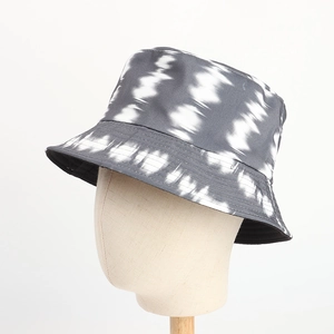 Detailed close-up of the grey and white tie-dye fabric and stitching on the bucket hat