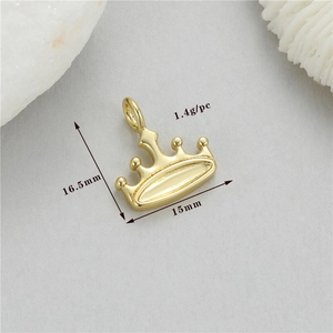 Macro detail of 14K gold plated crown pendant with 16.5mm height and 1.4g weight specs