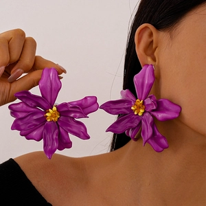 Vibrant purple acrylic flower stud earrings with yellow pistil for beach vacation style