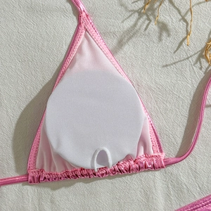 Detail of pink metallic bikini top with breathable mesh lining and removable pads