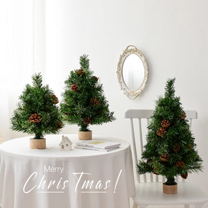 Mini Nordic Christmas trees with pine cones and wooden bases for tabletop festive decor