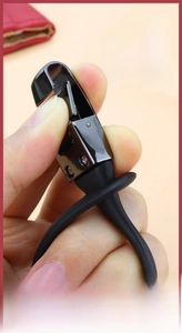 Close-up of zinc alloy car keychain with black chrome finish and spring clip mechanism
