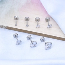 Detailed set of silver stainless steel screw back ear studs with clear cubic zirconia stones