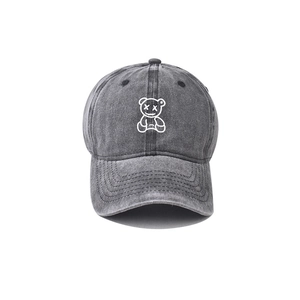 Dark grey washed cotton baseball cap featuring a white embroidered cartoon bear design