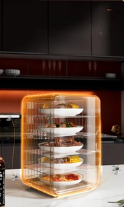 Five-tier transparent food cover showing multi-layer storage of dishes in modern kitchen