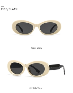Detail view of oval sunglasses featuring rice white frames and silver diamond rivets