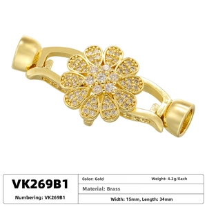 Detailed view of gold flower clasp in brass with zircon, size 15mm by 34mm for DIY jewelry