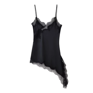 Detail view of black satin camisole dress with delicate irregular lace trim and thin straps