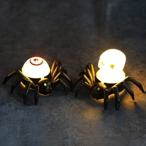 Halloween LED spider lights with red eyeball and white skull designs for spooky decor