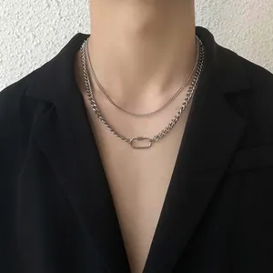 Double-layered stainless steel curb chain necklace with an oval carabiner screw clasp pendant