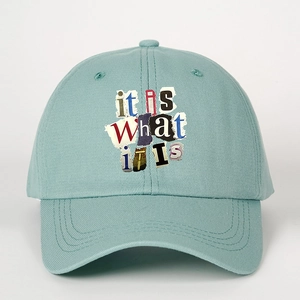 Adjustable light blue baseball cap with it is what it is collage text design