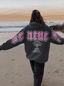 Detailed back view of a dark grey oversized hoodie with pink Kentucky graphic print