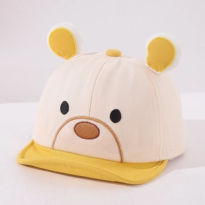 Detail of baby baseball cap with yellow 3D bear ears and cute cartoon embroidery