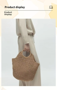 Detail view of straw tote bag with round handles and natural woven texture finish