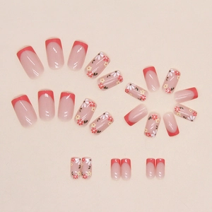 Quadratische Blumen-Nägel zum Aufkleben mit korallenroten French-Tips und Mustern