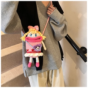 Close-up of handmade crochet bag featuring blonde hair and funny large pink lips