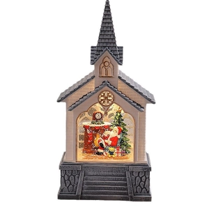 Christmas water globe lantern with Santa Claus and warm lights in a church-shaped house