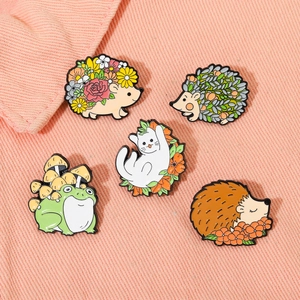 Set of 5 cartoon enamel pins featuring cute hedgehog cat and frog with floral designs