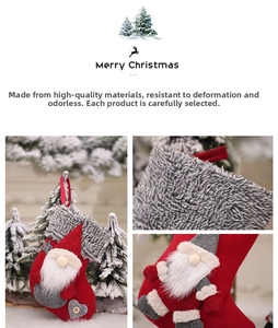 Detail of Christmas stocking with plush cuff and 3D Santa gnome for tree decoration