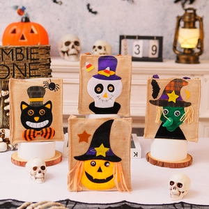 Set of 4 Halloween burlap gift bags with black cat, skeleton, pumpkin and witch designs