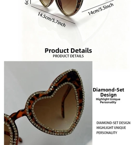 Detail view of heart-shaped leopard sunglasses with rhinestones and 14.5cm width dimension