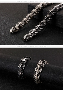 Macro detail of vintage dragon scale stainless steel bracelet with punk bone link design