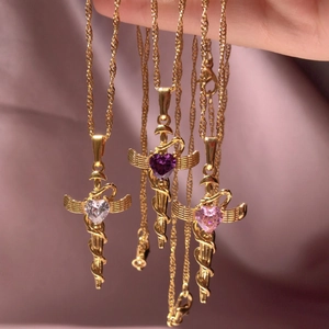 Gold winged sword heart snake necklaces with purple pink and white gemstones