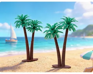 Miniatur Doppel-Palmenmodelle auf sonnigem Strandhintergrund für DIY Mikrolandschaften