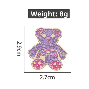 Detailed size view of a cartoon bear enamel pin with colorful stars and patterns