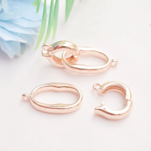 Macro shot of 14K gold filled rose gold heart pearl clasps for DIY jewelry necklaces