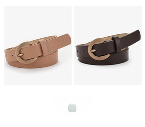 Detail view of two skinny alloy pin buckle belts in light camel and dark brown leather