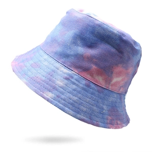 Detailed view of the tie-dye bucket hat featuring reinforced stitching and canvas texture