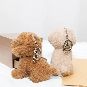 Cute teddy dog plush keychain in brown and beige with soft curly fleece and metal ring
