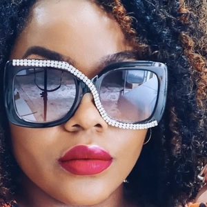 Square black oversized sunglasses for women featuring curved rhinestone crystal accents