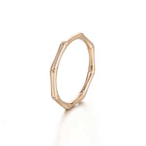 Minimalist rose gold stainless steel bamboo style ring for women in a clean studio shot